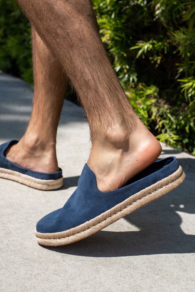 The Santiago Mule pairs a suede upper with a rope-wrapped midsole and mule construction for a laid-back, warm-weather look. Slip on with denim or shorts for any casual occasion. 